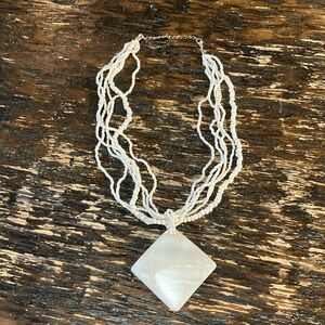 Mother of pearl shell and beaded necklace